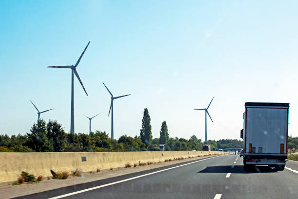 istock wind farm along the highway. Crisis Saving electricity 2002605830