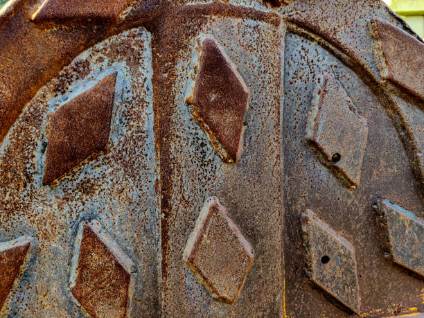 istock Rusty steel plate with cross-hatch non-slip texture pattern 2002611141