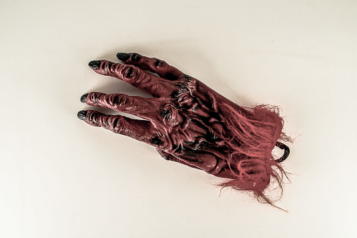 Close-up of carnival mask devil glove Object on a White Background