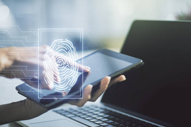 istock Abstract creative fingerprint illustration with finger clicks on a digital tablet on background, personal biometric data concept. Multiexposure 2002639905