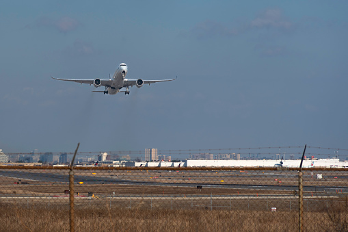 Commercial plane takes off from Lester B. Pearson Toronto International Airport