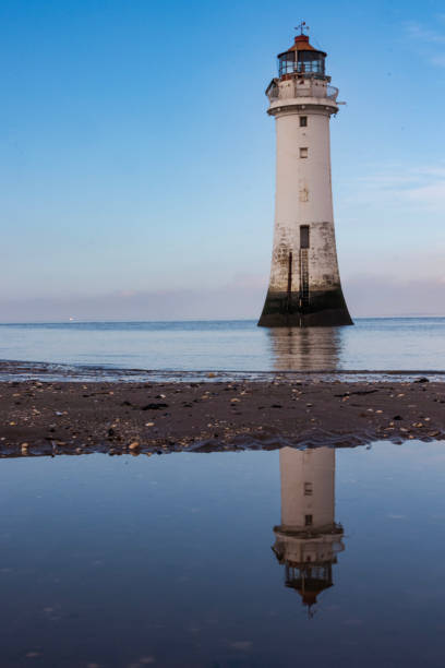 istock Liverpool Lighthouse and calm Seas go 2002655287