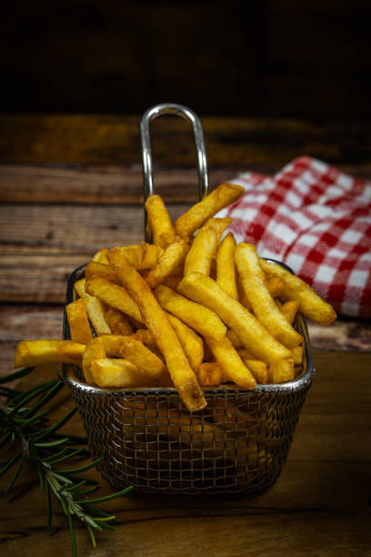 istock dish of fries, close-up, on a table 2002670724
