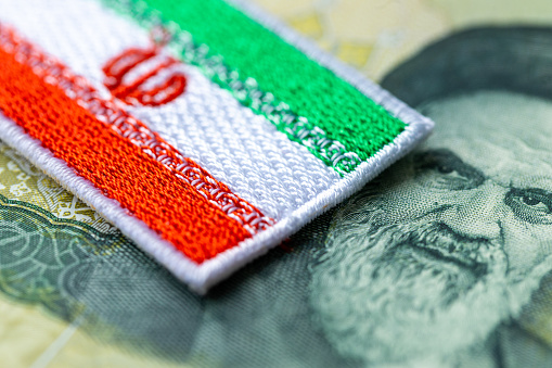 Iranian rial and Iranian flag, Financial concept, Value of Iranian currency, country's economy