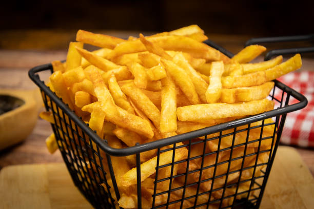 istock dish of fries, close-up, on a table 2002698490