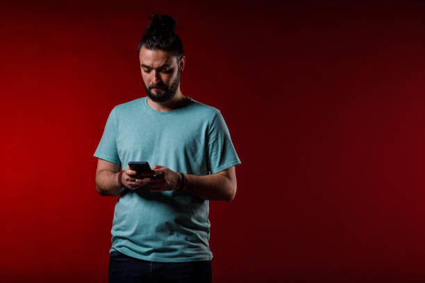 istock Man calling a friend from smart phone 2002704368
