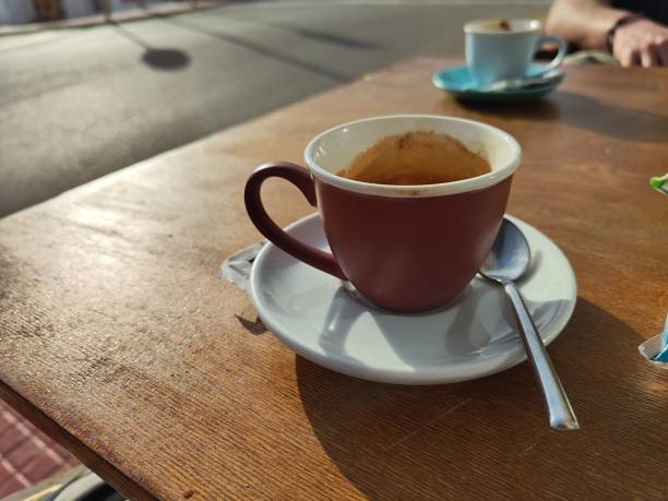 istock Hipster coffee cups on a wooden table 2002725257