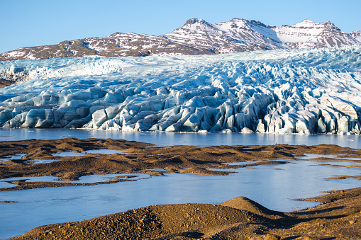 The Mendenhall Glacier has retreated 1.75 miles since 1929 due to climate change. It is receding so quickly that by 2050, it might no longer be visible from the visitor center it once loomed outside.