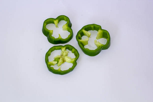 Capsicum slices isolated on white background
