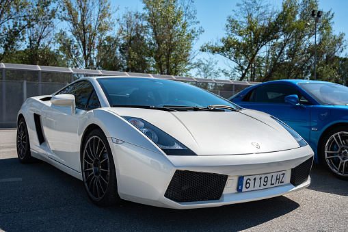 Montmelo, Spain – October 20, 2023: Front view of pearl white Lamborghini Gallardo Italian supercar