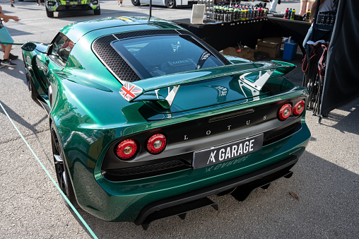 Montmelo, Spain – October 20, 2023: Rear view of a spectacular British green Lotus Exige