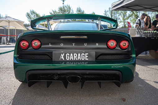 Montmelo, Spain – October 20, 2023: Rear view of a spectacular British green Lotus Exige