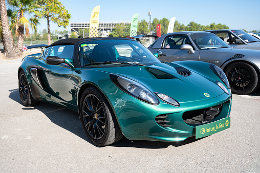 Montmelo, Spain – October 20, 2023: Front view of a light English sports car, the Lotus Elise in green color