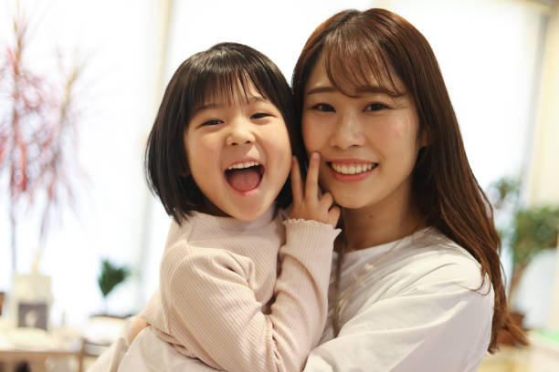 istock smiling parent and child 2002818825