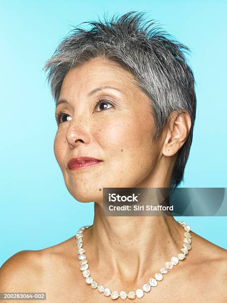 Mature Woman Wearing Pearl Necklace Stock Photo - Download Image Now - Spiky Hair, Naked, One Woman Only