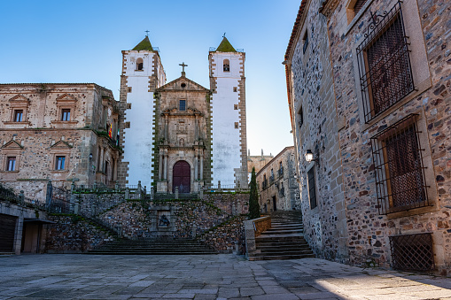 White-towered church in the square of the medieval town of Caceres, Extremadura