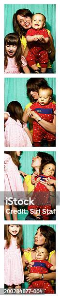 Mother With Children In Photo Booth Stock Photo - Download Image Now - Photo Booth, Photo Booth Picture, Photography
