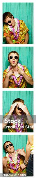 Young Man Wearing Camisa Hawaiana Y Leis En Cabina De Fotos Foto de stock y más banco de imágenes de Foto tamaño pasaporte