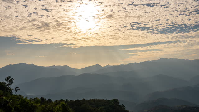 Time Lapse Of Topical Mountains With Dramatic Clouds Sky And Sunbeam