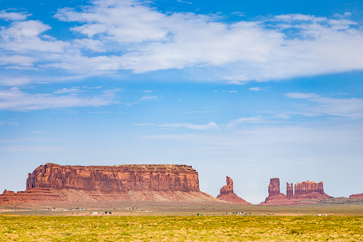 giant sandstone formation in the Monument valley under blue sky