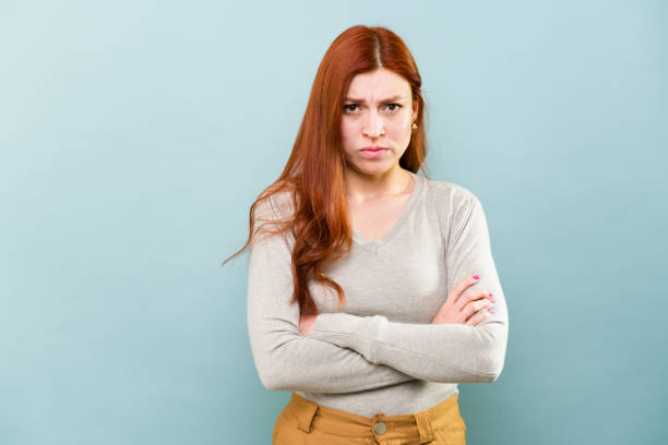 istock Upset attractive woman looking angry ready to fight 2002939150