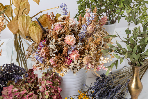 Dried flowers arrangement. Sustainable floristry. Home decor with dried flowers.