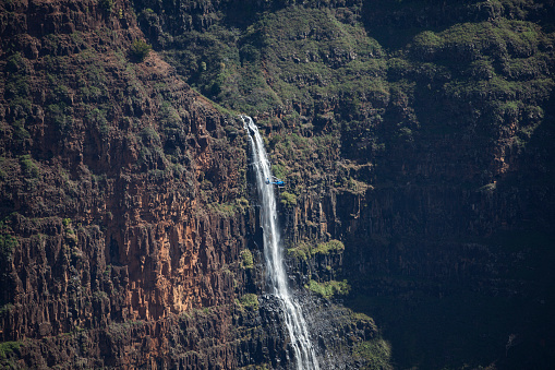 awesome waipoo falls on kauai island, hawaii islands, usa.