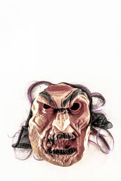 Traditional Japanese mask of a demon on white background.