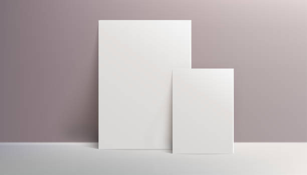 istock A realistic canvas mockup with blank space, by the wall on dusty pink background, perfect for posters, art projects, paintings, presentations, marketing materials. Not AI. 2003092653