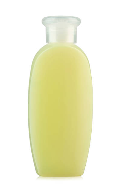 Plastic bottles for containing shower cream, shampoo, hair conditioner, and body cleanser isolated on white background.