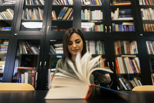 Young woman in library