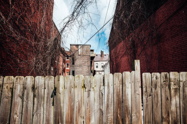 Walking on Prince George Street with brick houses, historical buildings in Williamsburg, Virginia