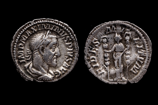 Roman coin, AR Denarius,Maximinus, Rome mint, 236-238 AD., ,Ancient roman coin with portrait of emperor isolated on black