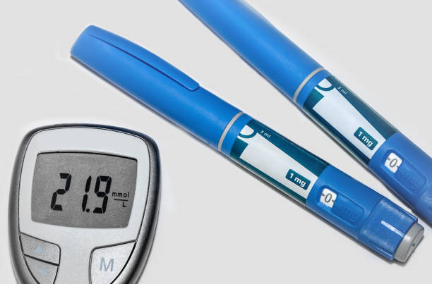 糖尿病の血糖値計と注射ペン。 - hyperglycemia ストックフォトと画像