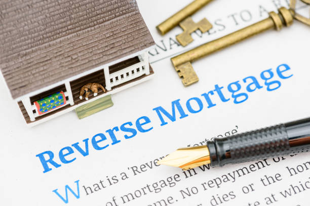 istock Fountain pen on a reverse mortgage document. A reverse mortgage is a loan for homeowners, converting home equity into cash. Repayment is typically deferred until the owner moves out or passes away. 2003198473