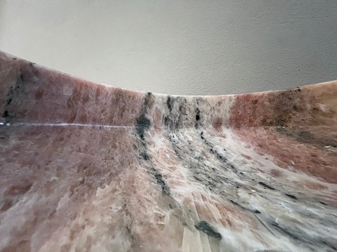 pink marble texture on gray background