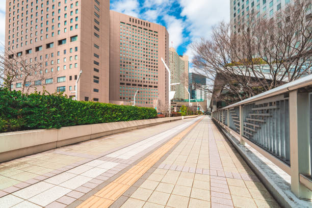 Empty footpath in office park, Shinjuku, Tokyo