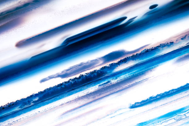 blue tainted agate landscape macro photography detail texture. close-up polished semi-preciomacro photography detail texture background. close-up raw rough unpolished semi-precious gemstone