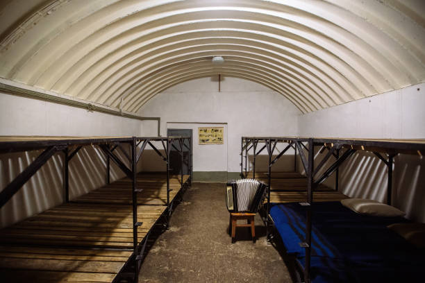 Old soviet bomb shelter. Sheltering room with wooden double-decker beds