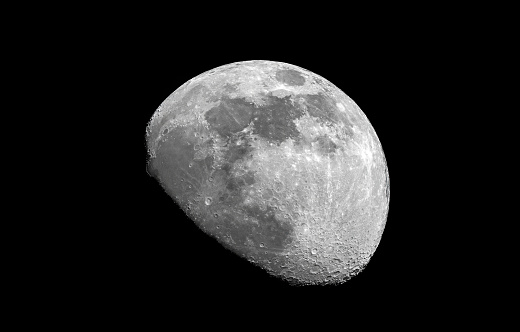 Wanning gibbous moon 65% in the dark night sky