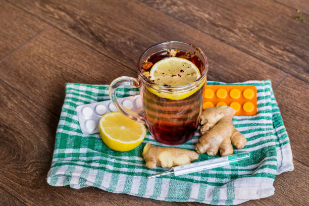istock Tea with lemon and pills 2003450579