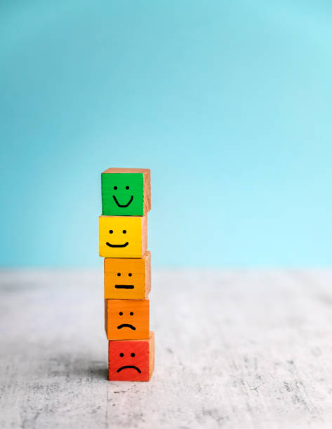 istock Wooden cubes with different emotions . Empathy concept 2003506305