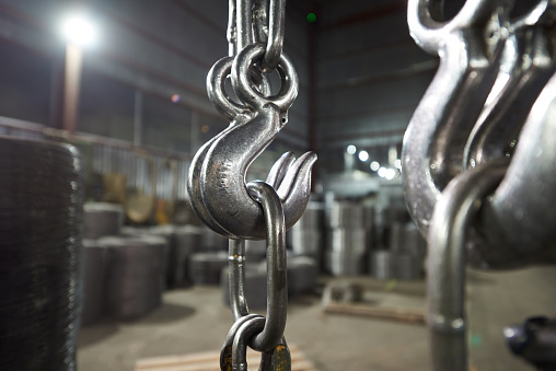 Metal steel hook of a cargo crane in production.