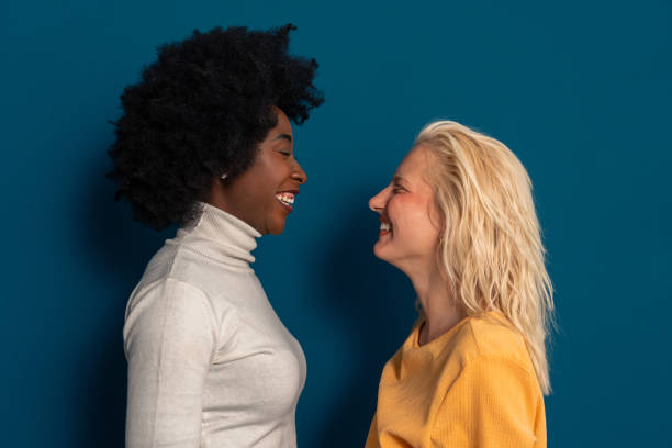 istock Ecstatic vibrant female friends expressing happiness 2003527384