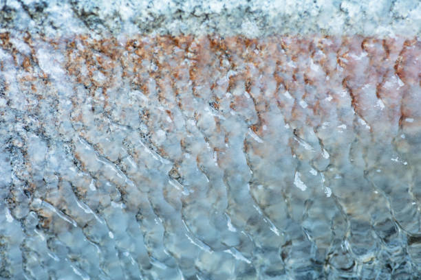 A close-up of ice formations in a fountain, in the mountains.