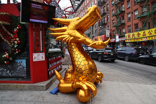 An inflatable Drago to Chinese New Year sits in a plaza in Chinatown in New York, New York, Sunday, Feb. 11, 2024. The Chinese New Year 2024 is a Year of the Dragon, more specifically, Wood Dragon, starting from February 10th, 2024, and lasting until January 28th, 2025.