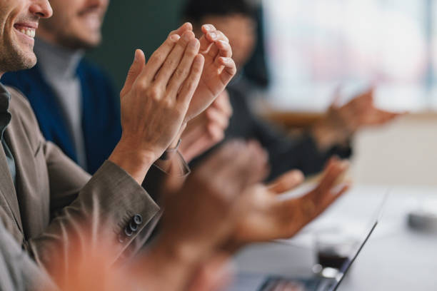 istock Business Team Applauding at a Successful Meeting 2003613065