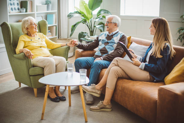 istock Senior couple consulting with insurance agent 2003686066
