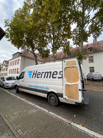 Kehl, Germany - Oct 24, 2020: White Vw Crafter delivery van with hermes logotype. Open door during delivery - is German delivery company headquartered in Hamburg, owned by the retail company Otto GmbH