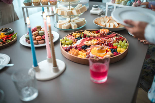 istock Gourmet Party Spread with Vibrant Candle Ambience 2003808307